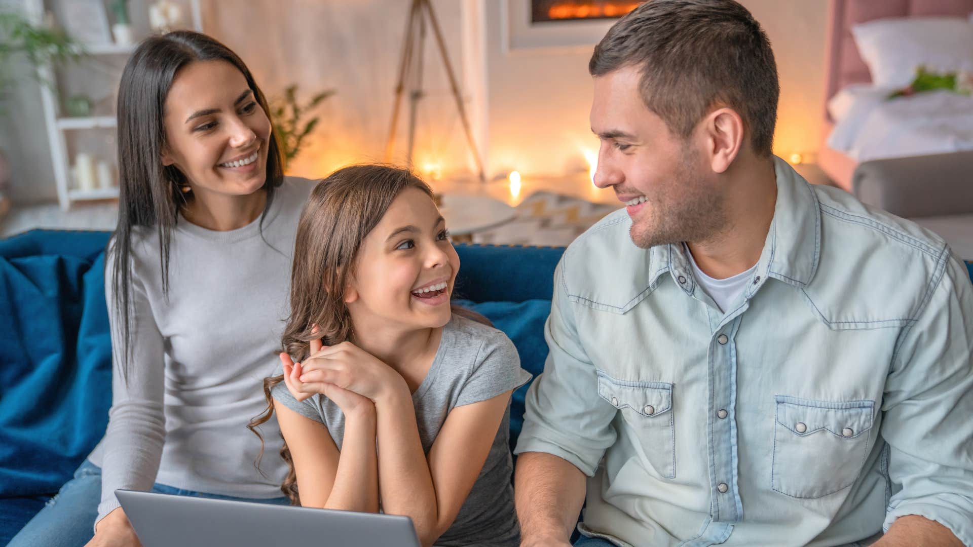 smiling parents saying we'll figure it out to excited daughter