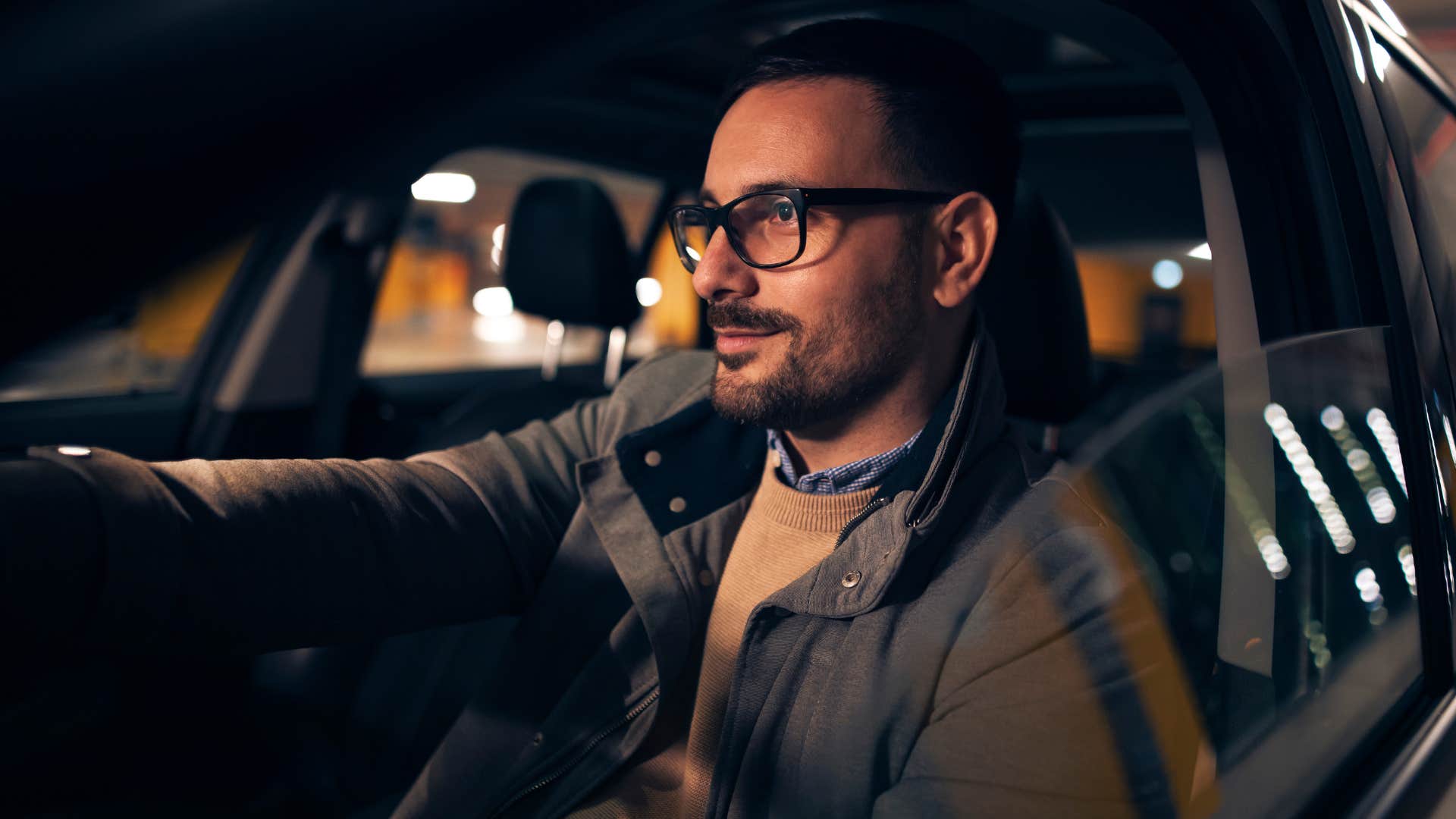 man with an empty gas tank driving at night