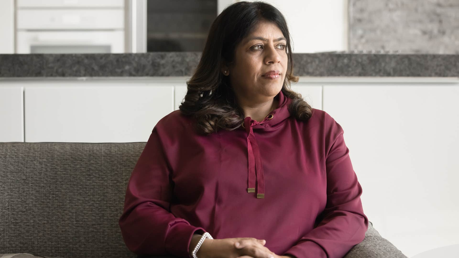 older woman upset nobody is visiting her at home