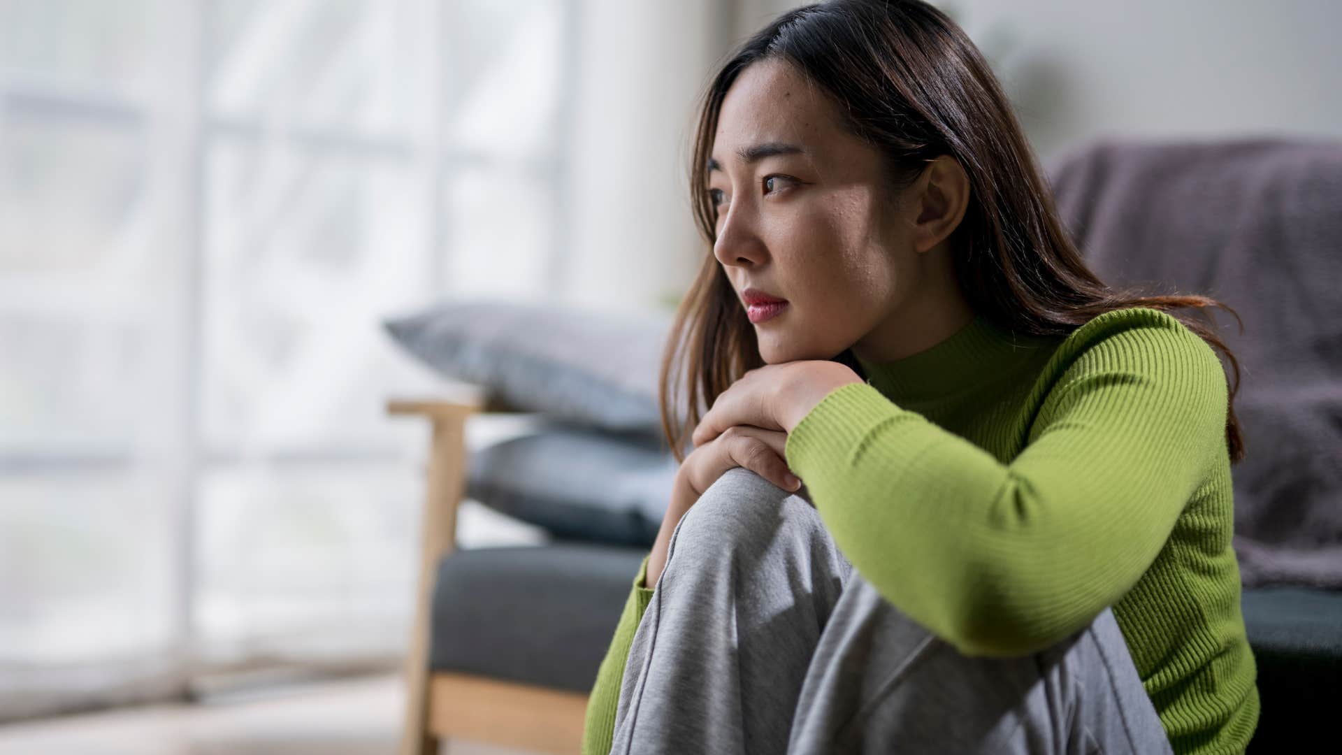 woman who was a gifted kid sitting alone at home