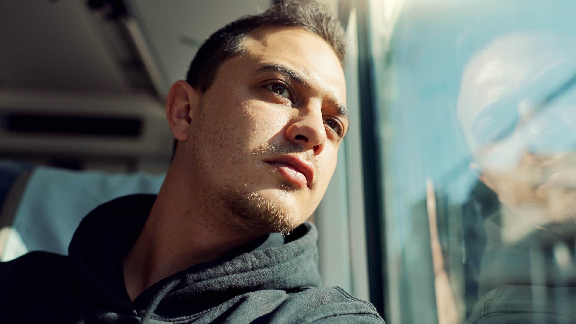 hyper-independent man sitting on the bus