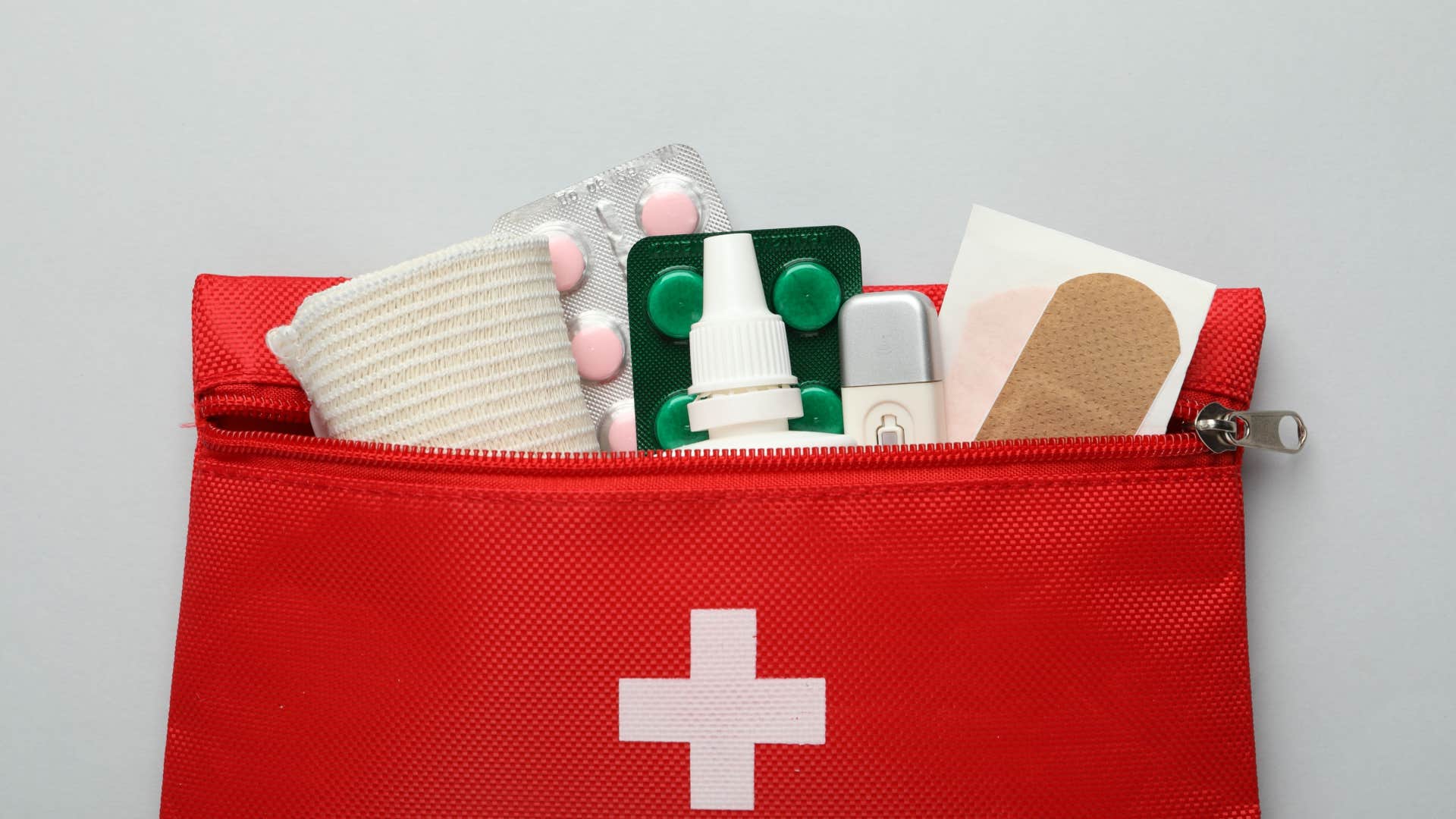 first aid kit in a mans car