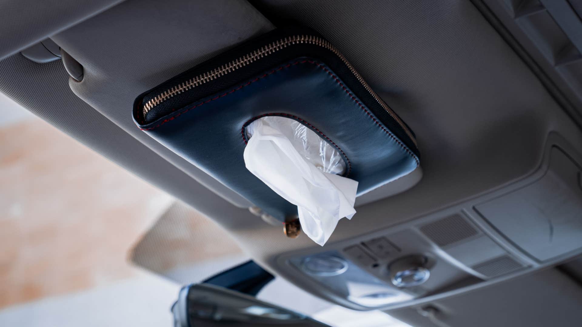tissues in a mans car