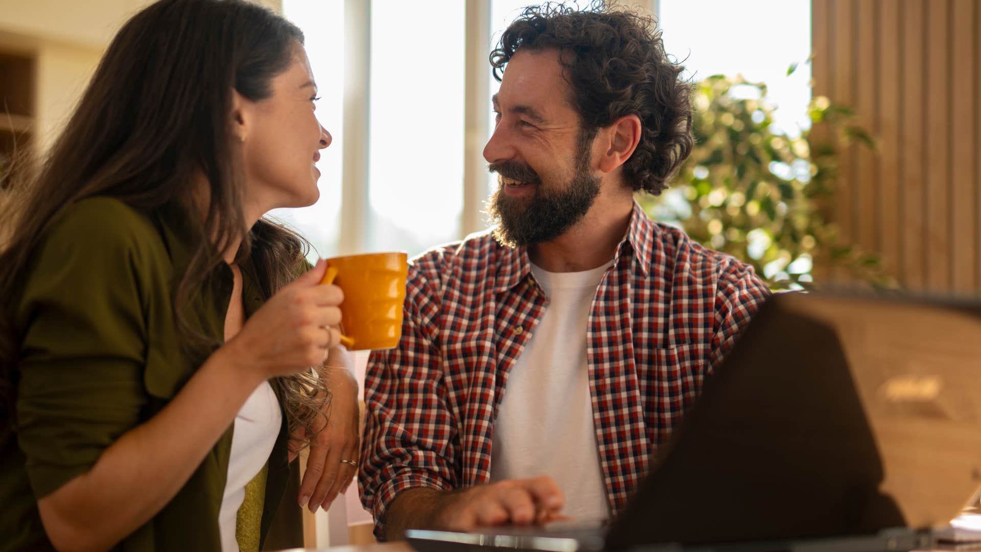 Man asking "Can I help you with anything?" to his wife.