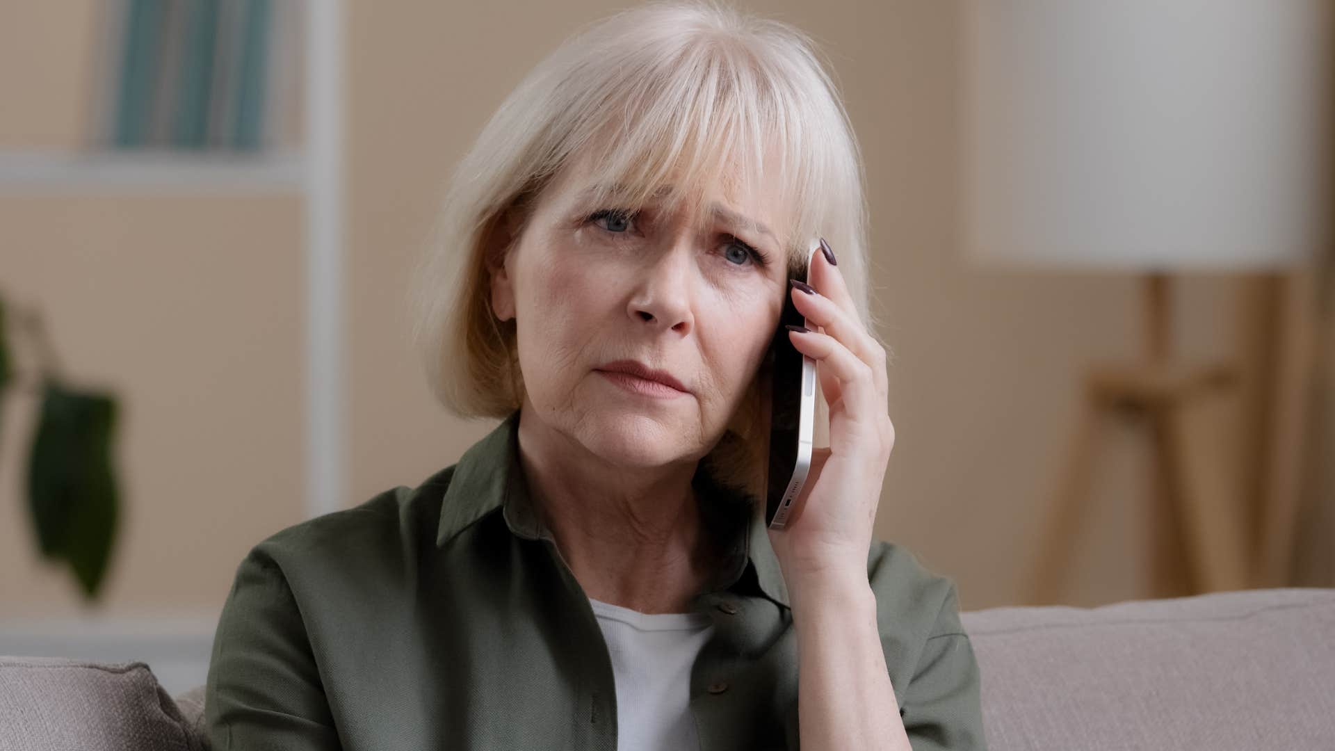 upset women telling adult kids on the phone we don't have to do anything this year