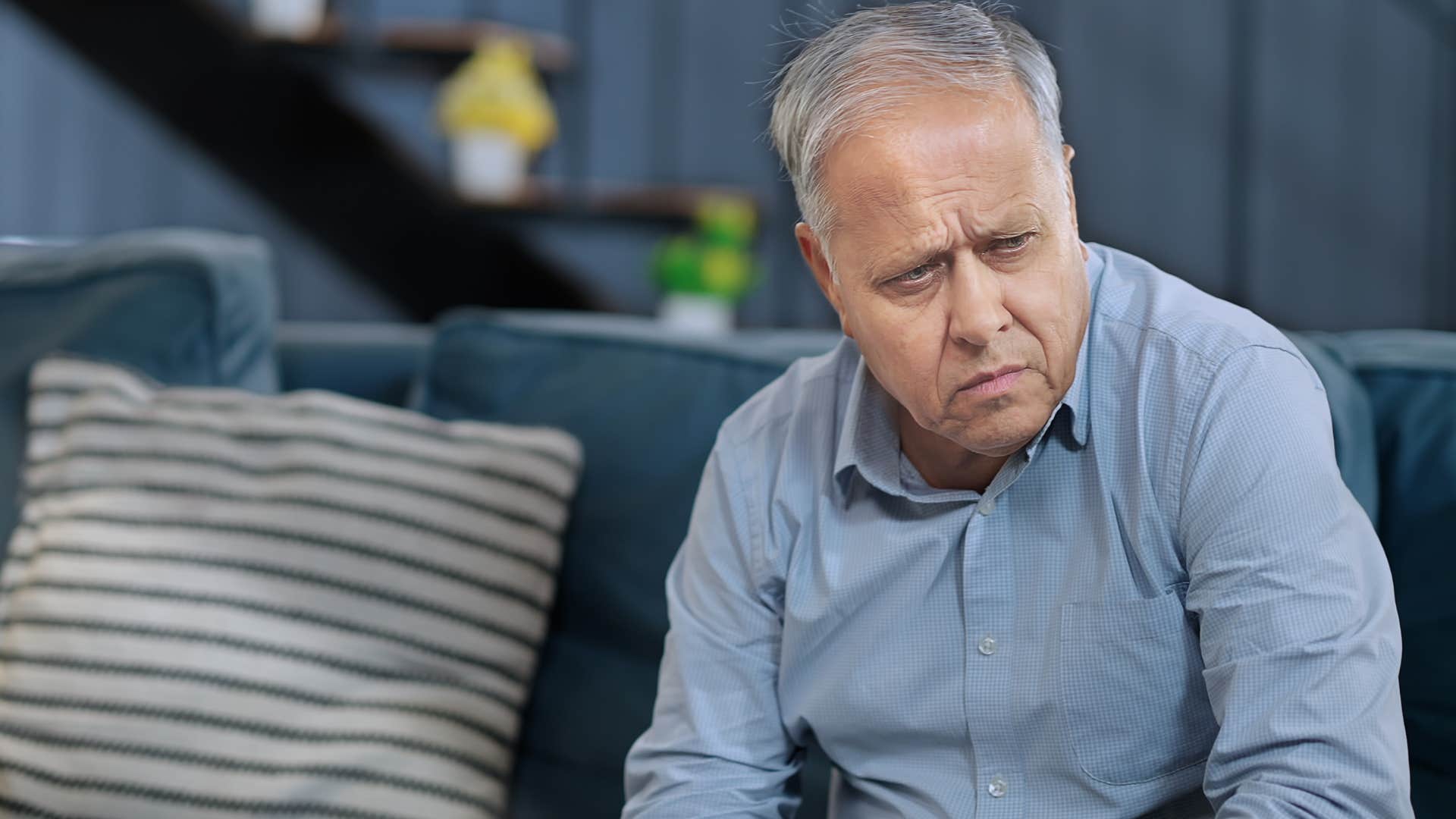 older man who feels physically limited sitting at home alone