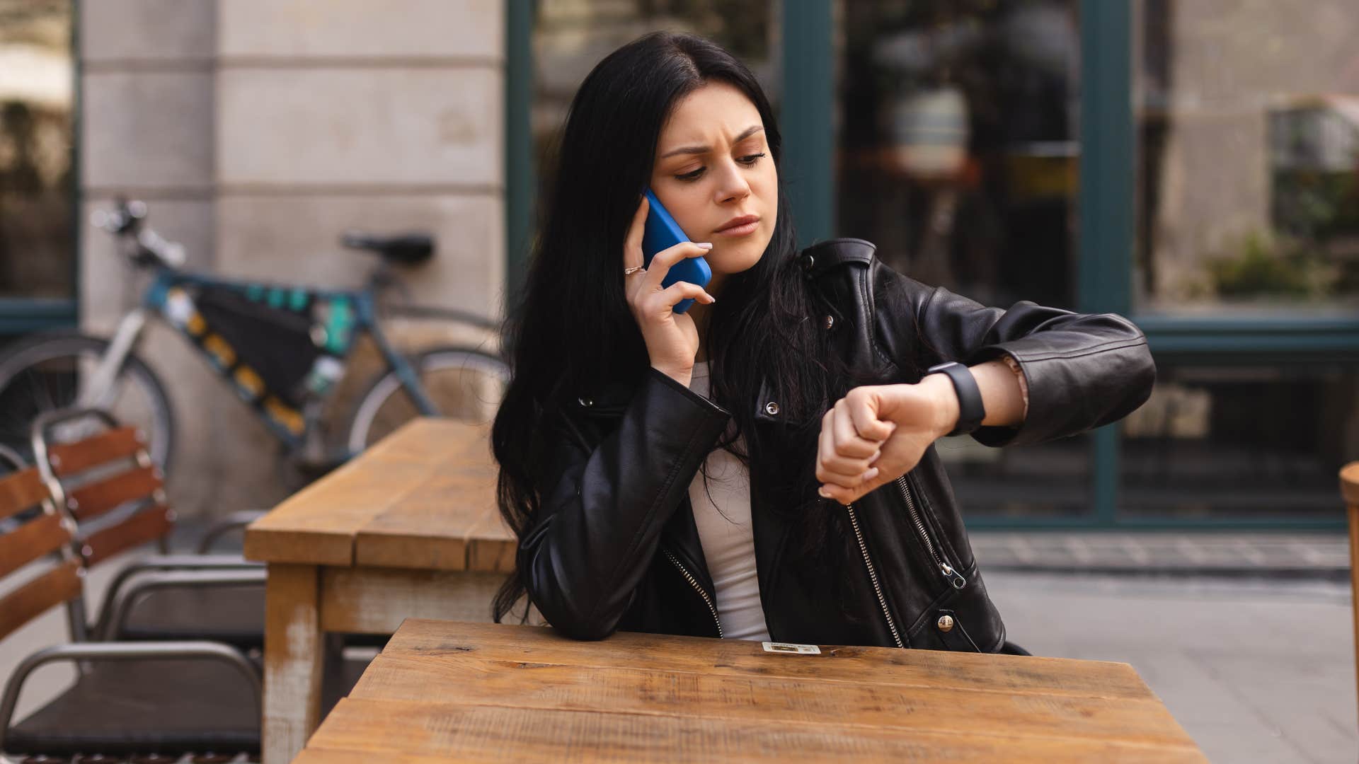stressed woman being available all the time talking on phone