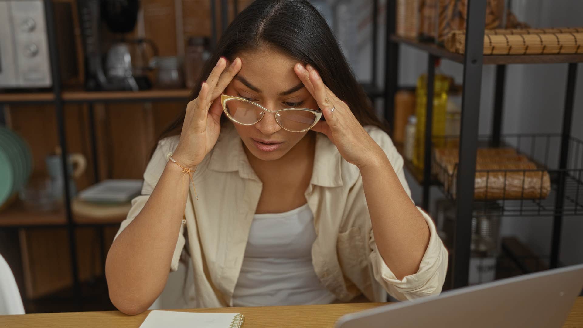 exhausted woman who's carrying the cognitive load of her household