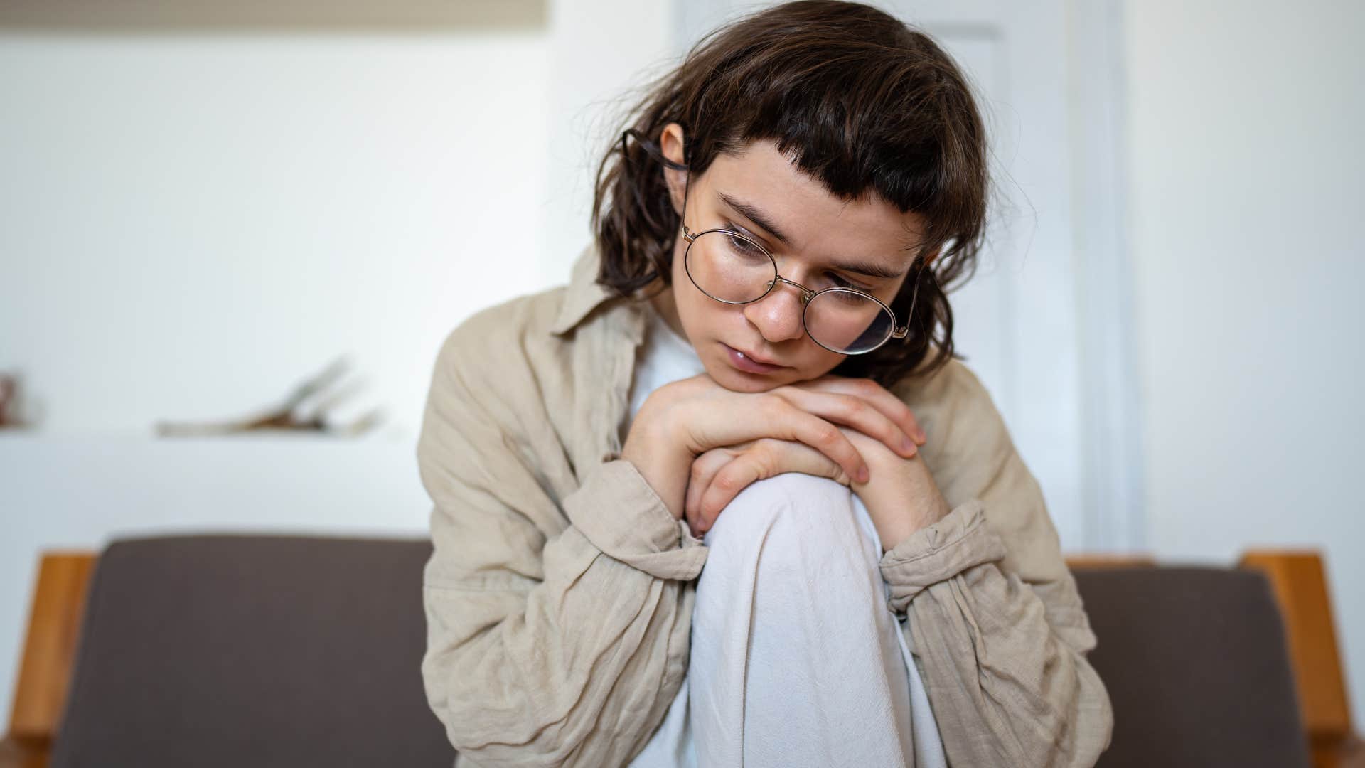 stressed woman dealing with guilt and internalized shame