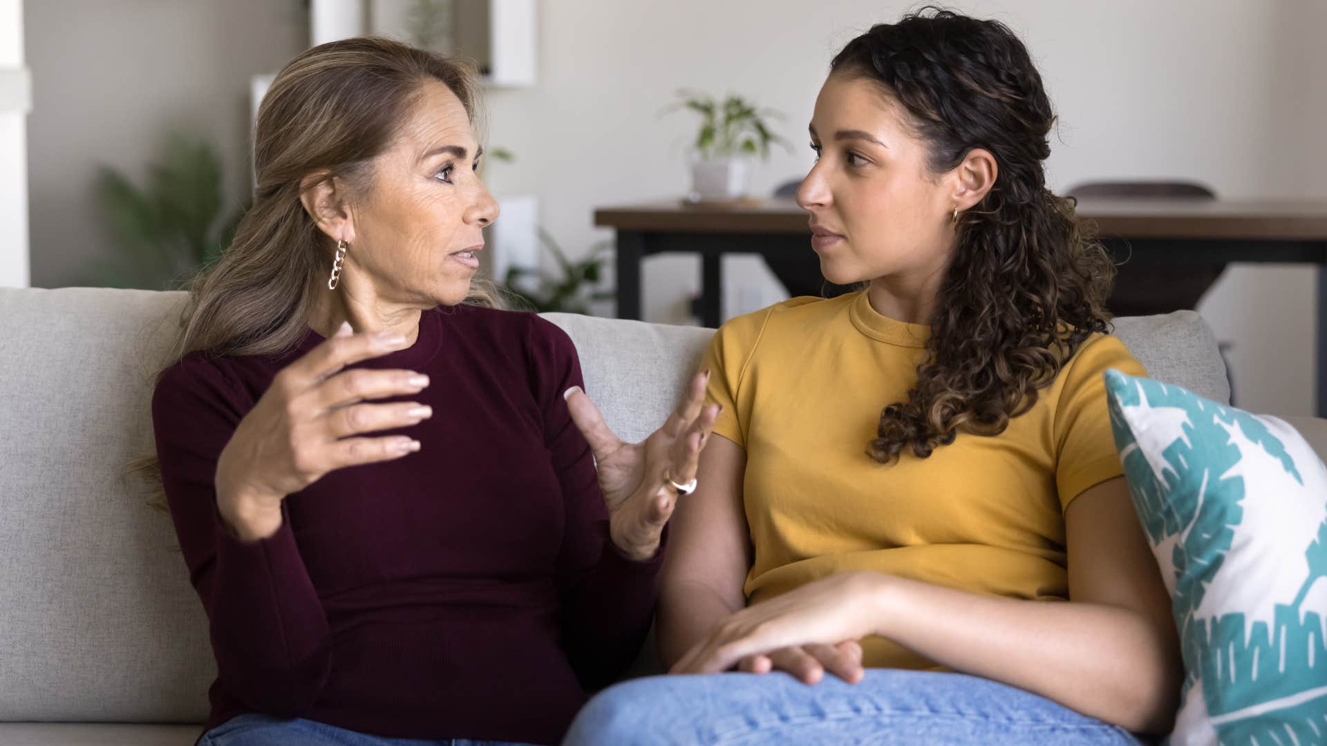stressed woman keeping the peace with her adult daughter