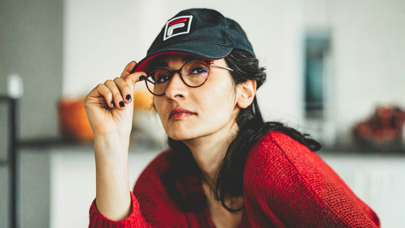 Strong, confident woman walking away showing the art of knowing your worth and lessons learned from no longer choosing disappointing men.