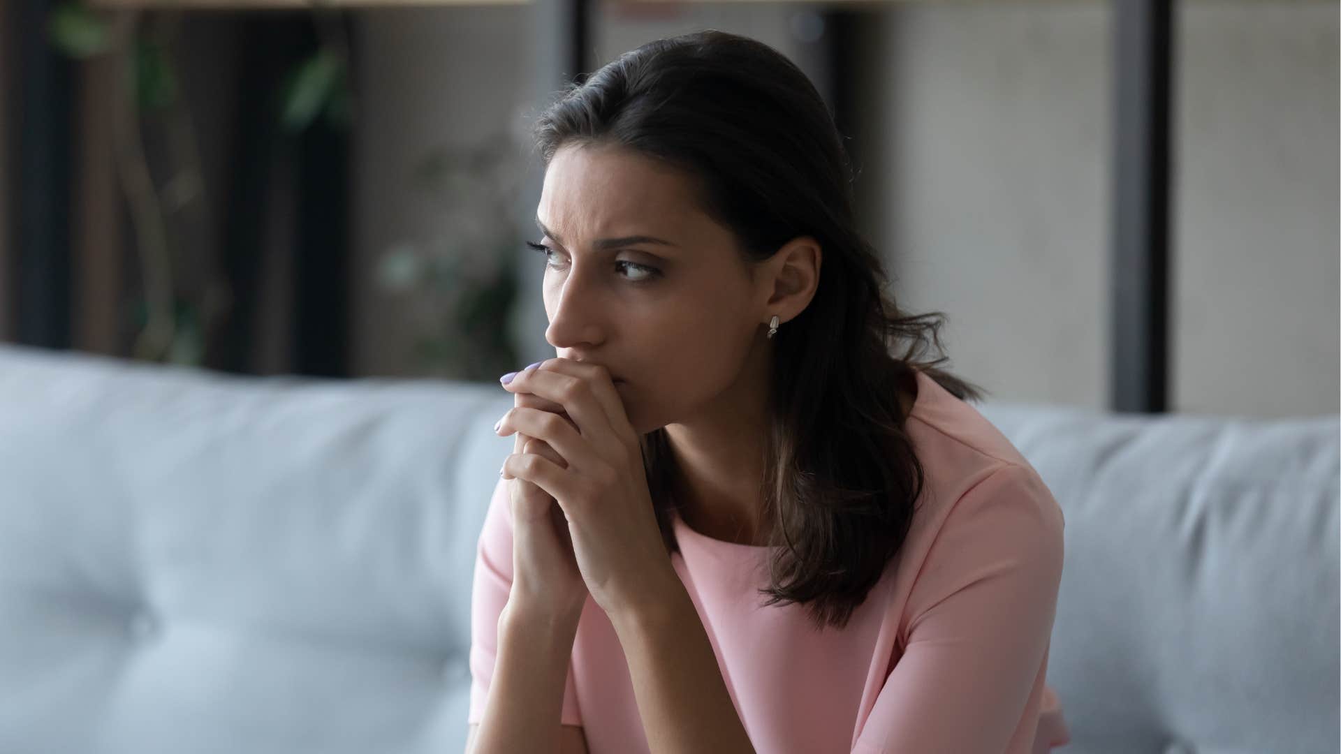 Strong woman considers the paradox of disappointment