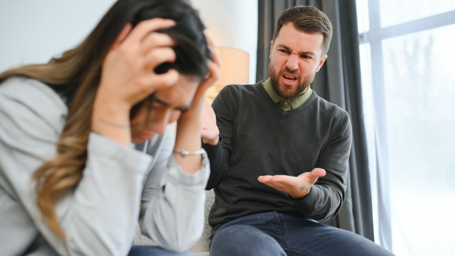 man telling his wife she acts like shes perfect