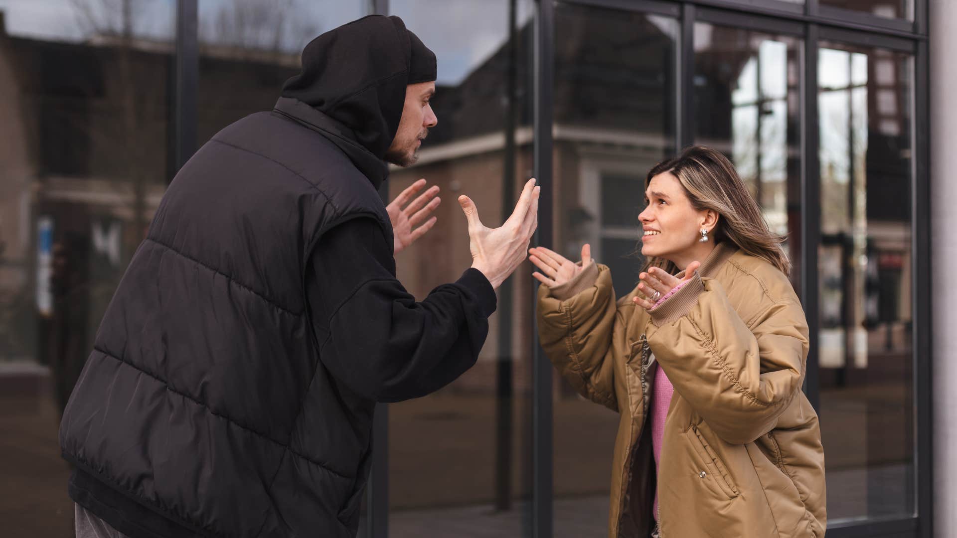 resentful man fed up with his wifes success yelling at her