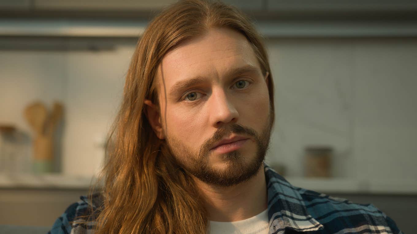 quiet serious man struggling wtih emotions