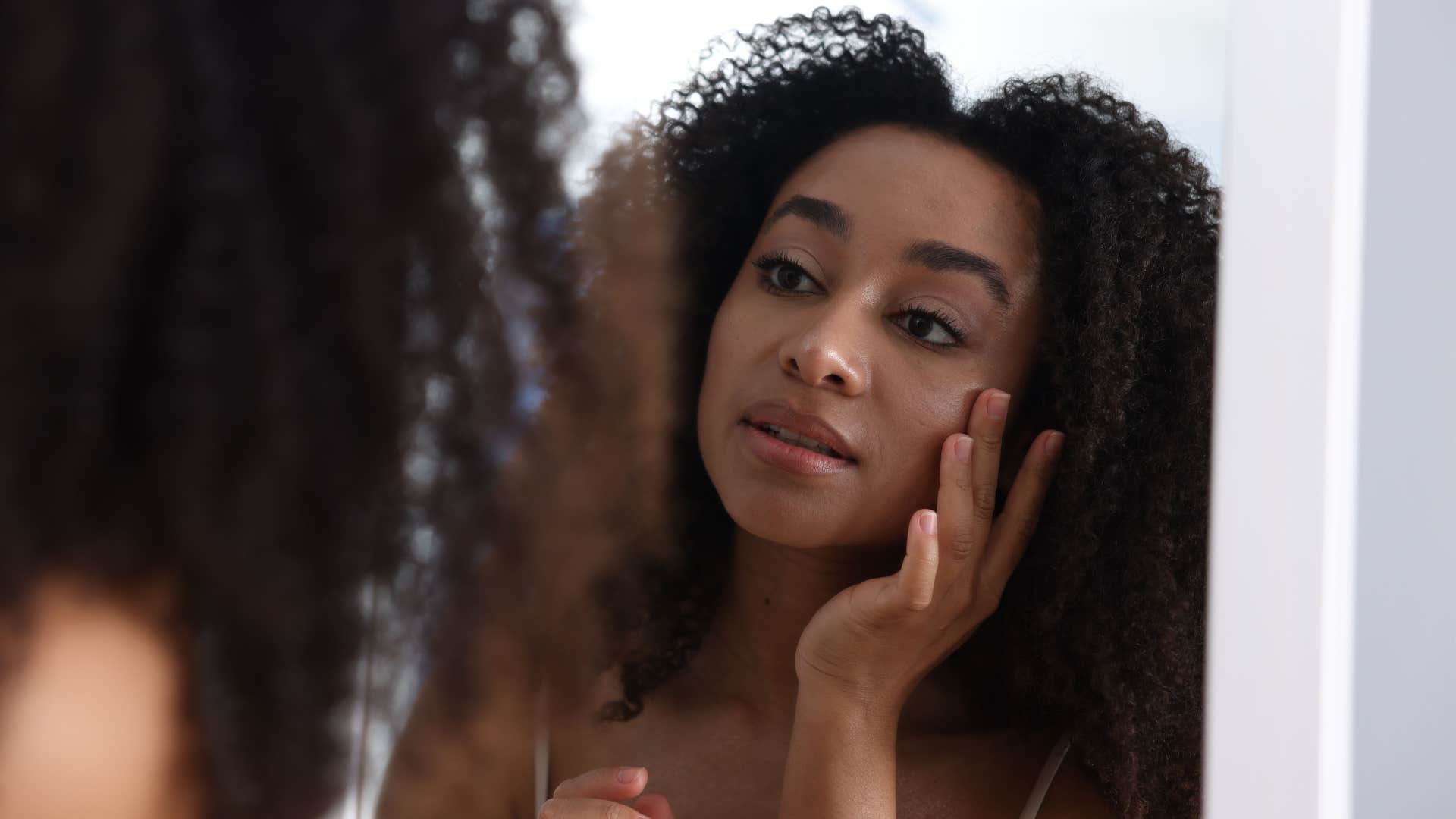 woman who is going through spiritual transformation as she is experiencing changes in her body