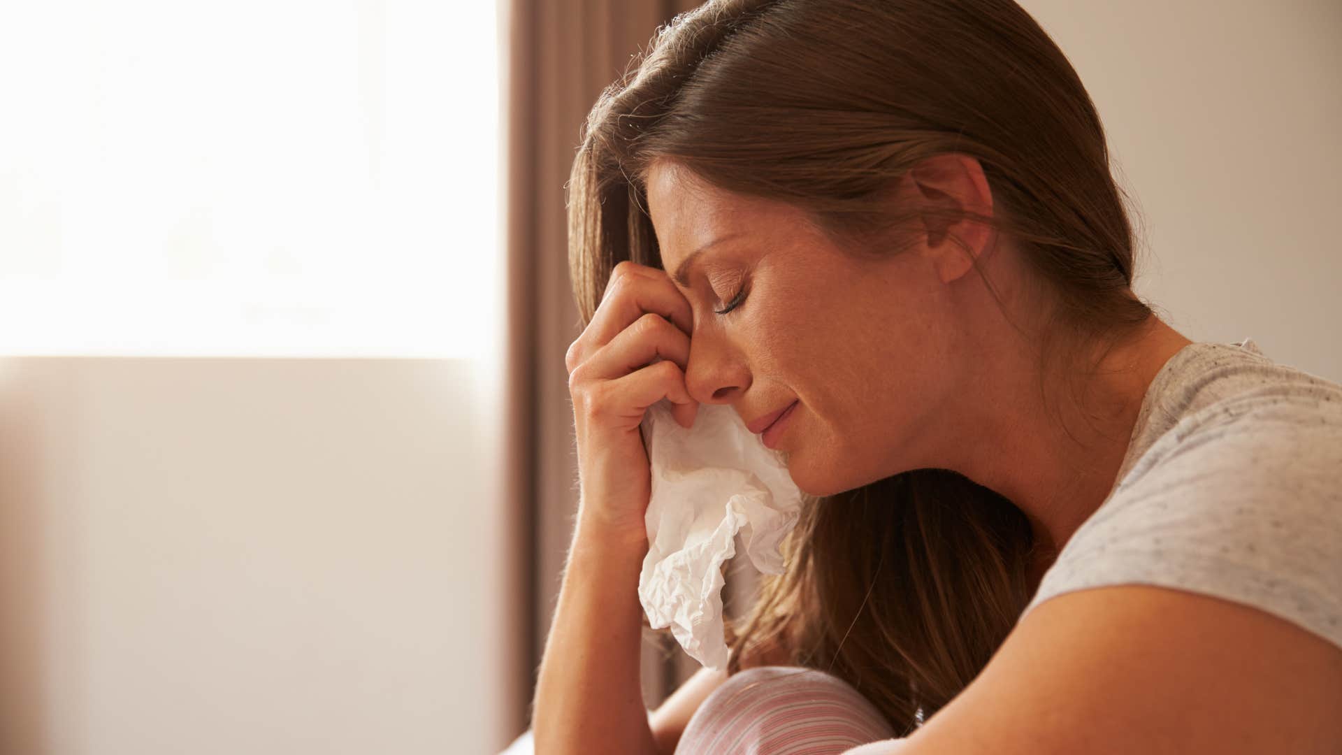 woman who is going through spiritual transformation as she is really emotional