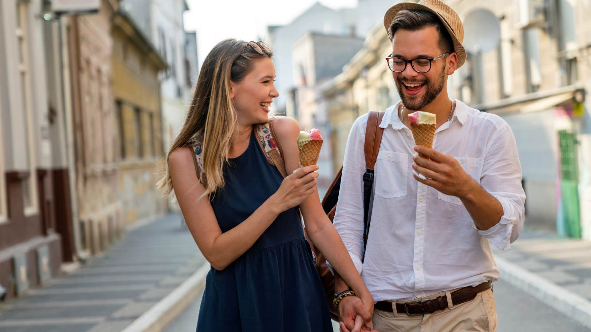 couple walking and eating ice cream