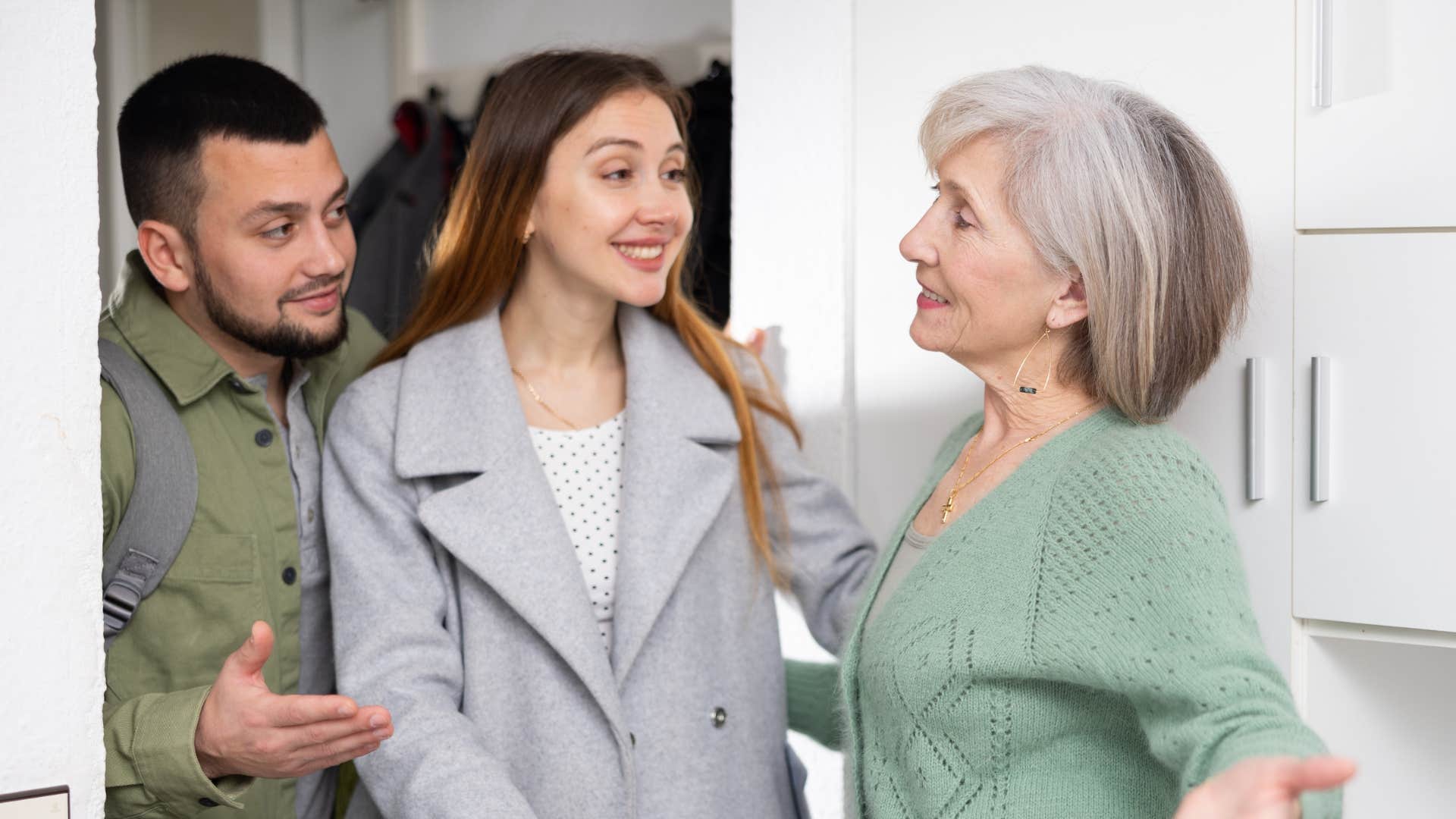 man introducing woman to meet mom