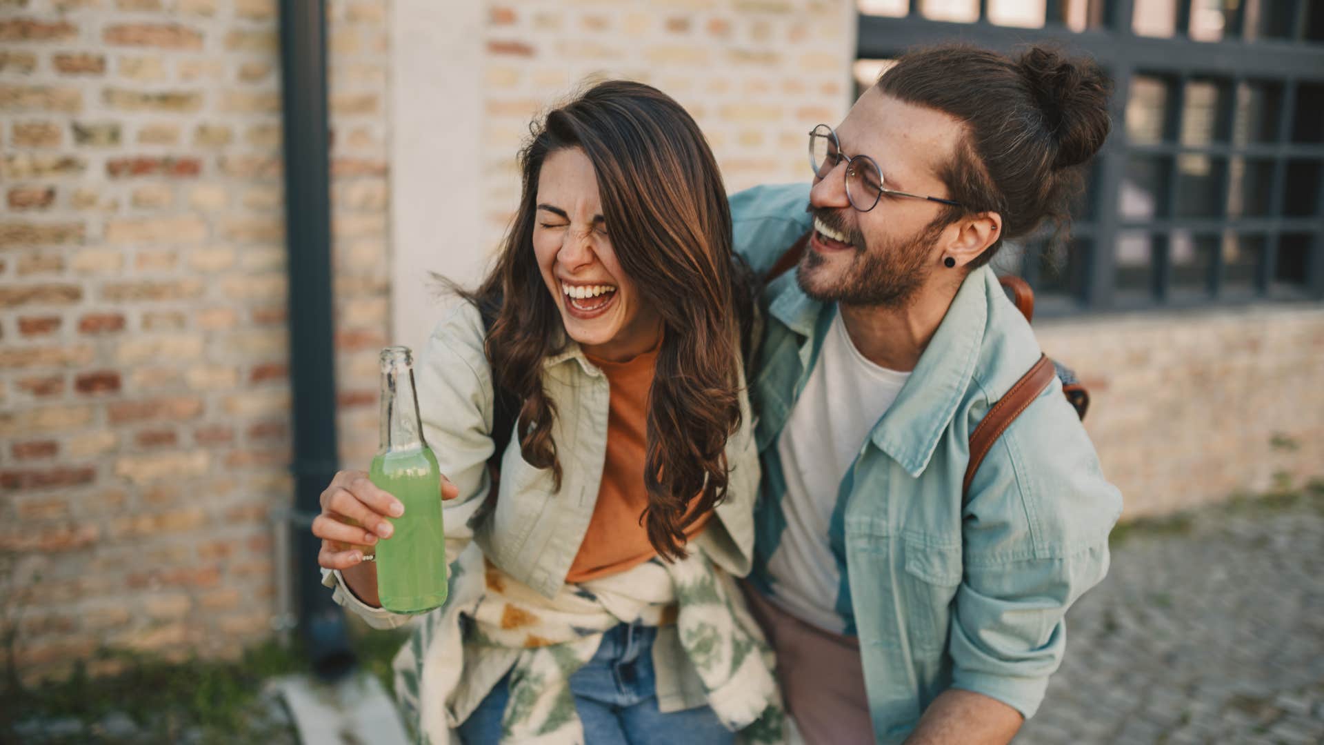 couple laughing together sharing humor