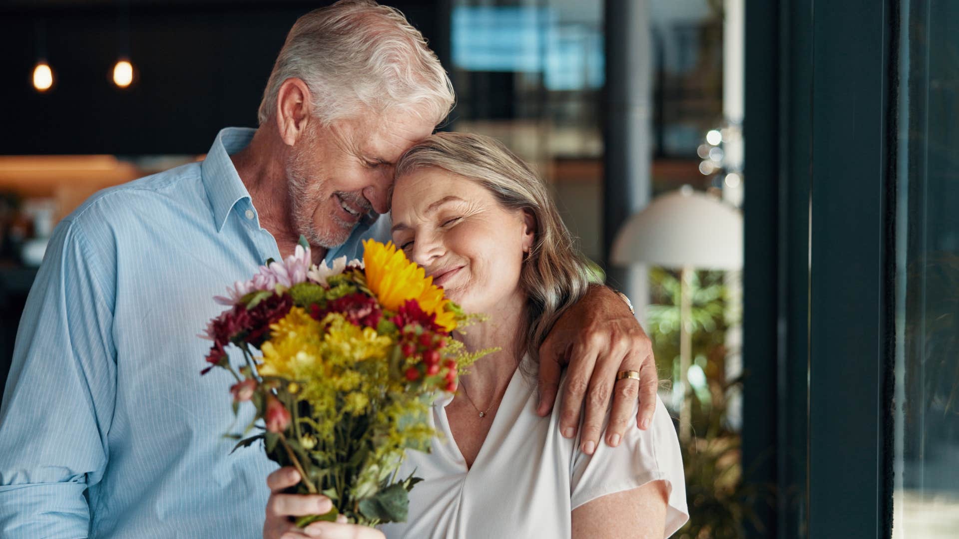 husband giving wife flowers