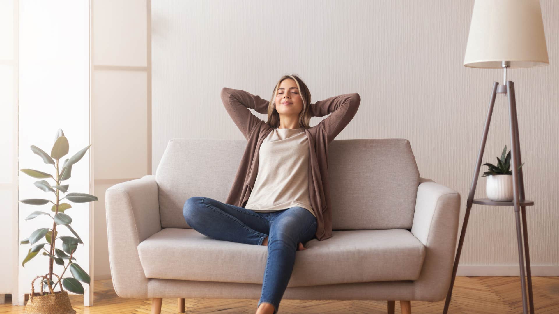 woman sitting in room she doesnt use