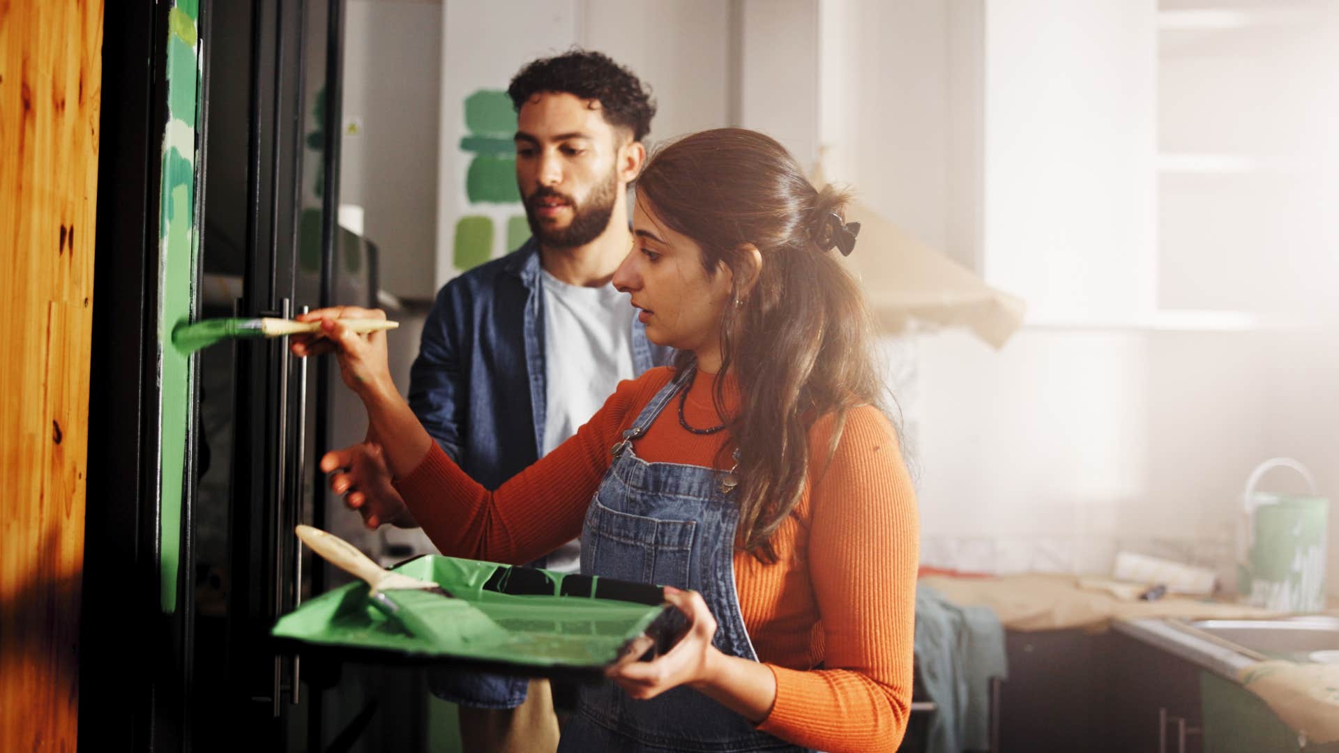 couple painting home