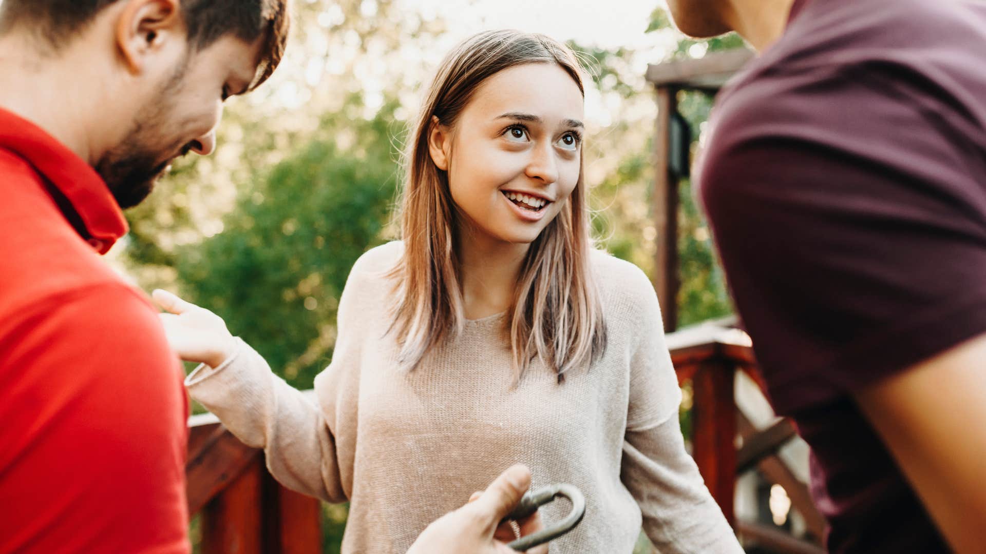 woman exaggerating stories talking to friends
