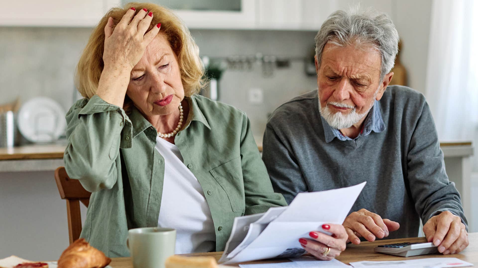 older couple thinking about the old version of their relationship