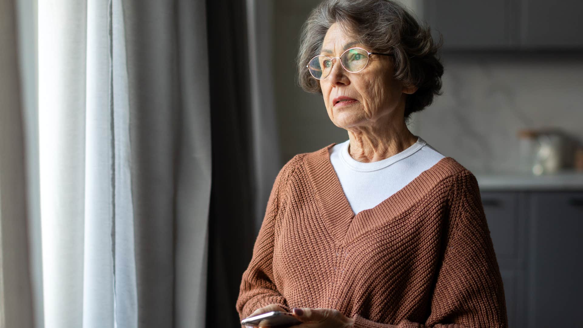 woman thinking about her own missed childhood