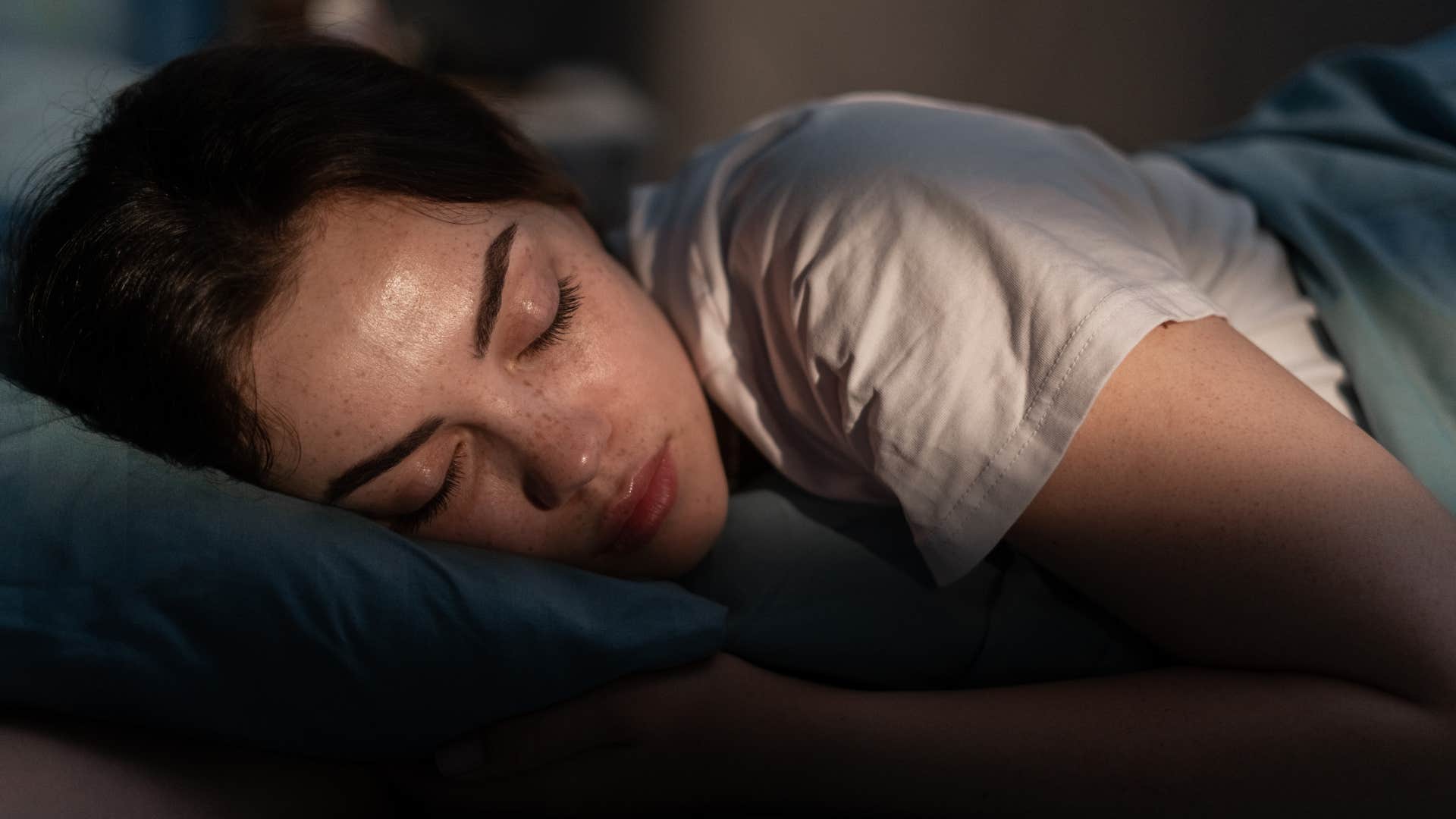 woman who sleeps a lot lying in bed