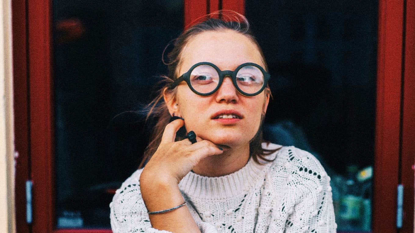 Socially aware person reacting awkwardly showing the phrases people with real social skills know are rude to say to someone single.