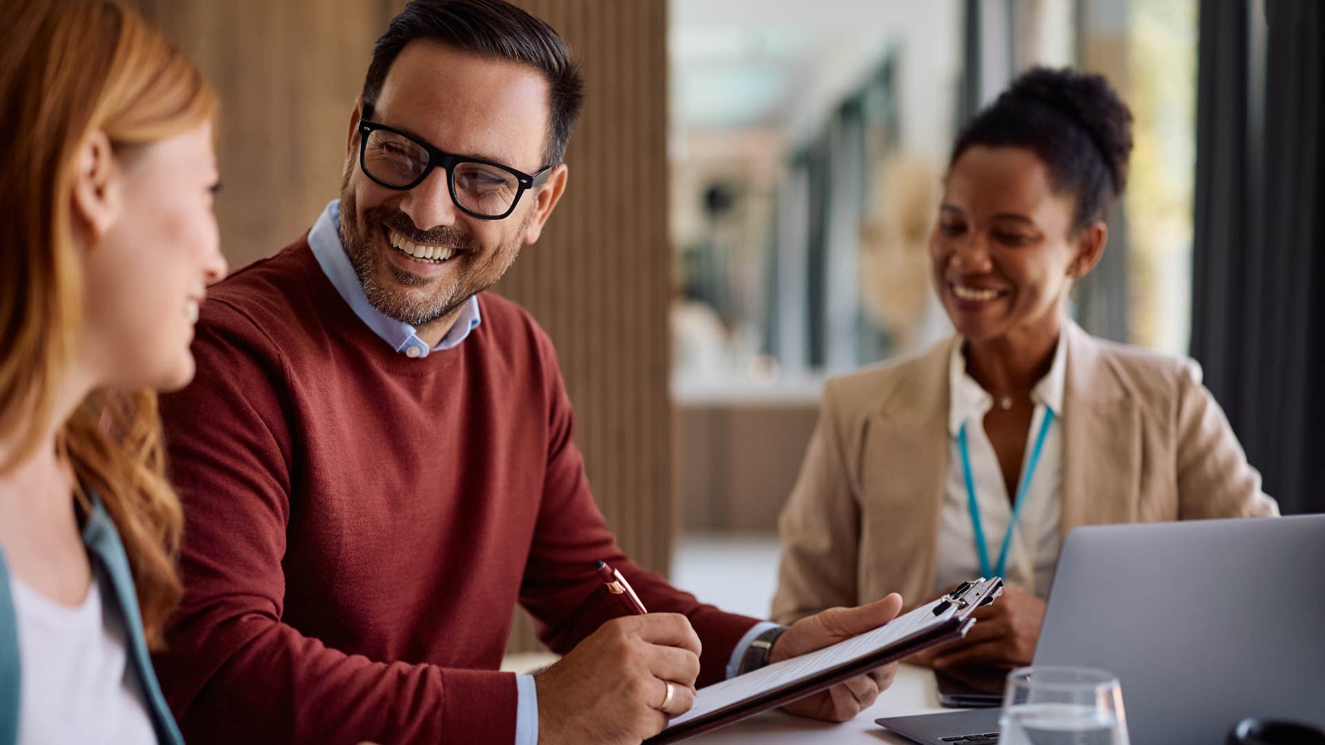 man saying I'm listening to a co-worker