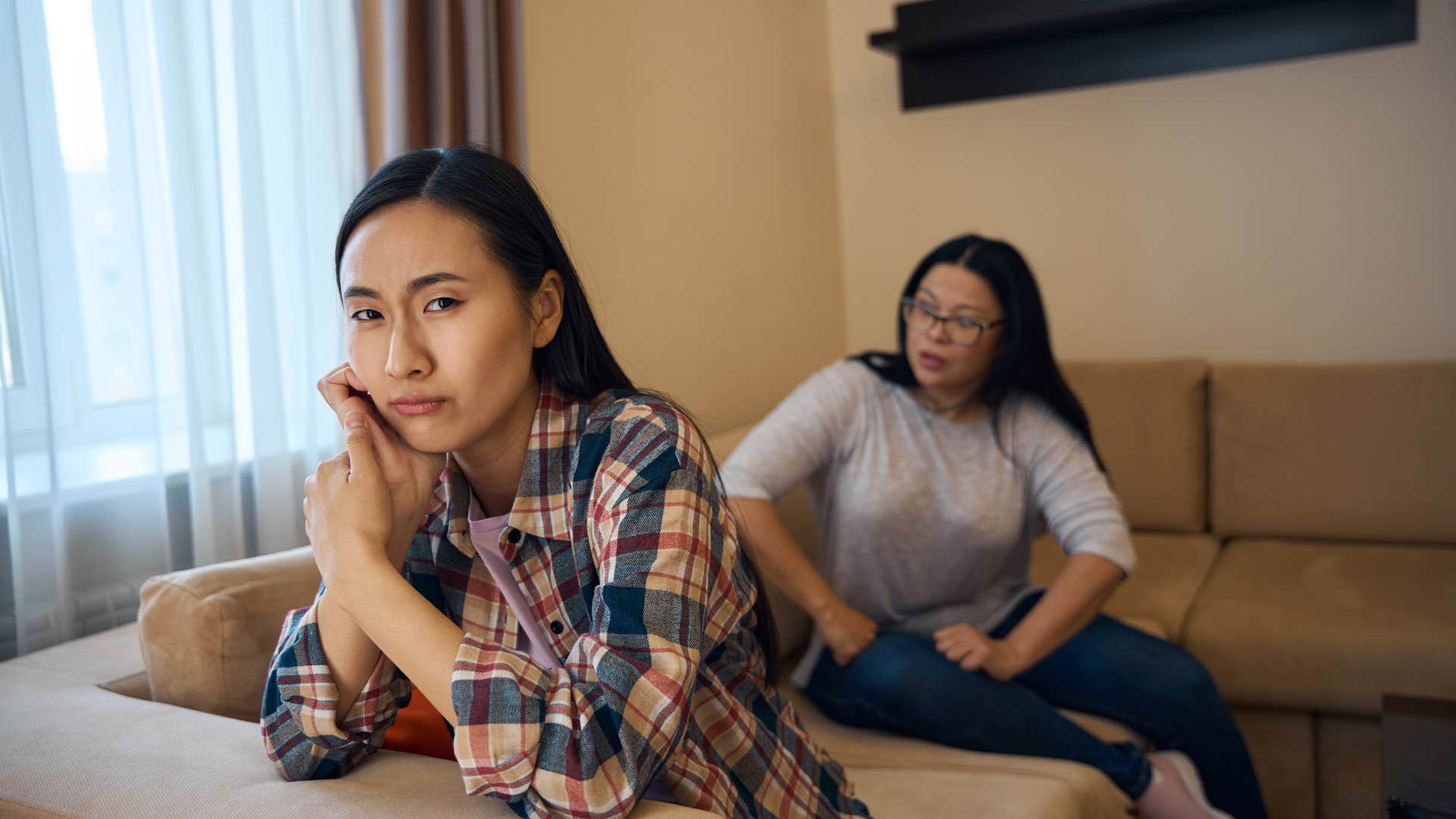 woman who can't fully relax around her mother because of loss of authority