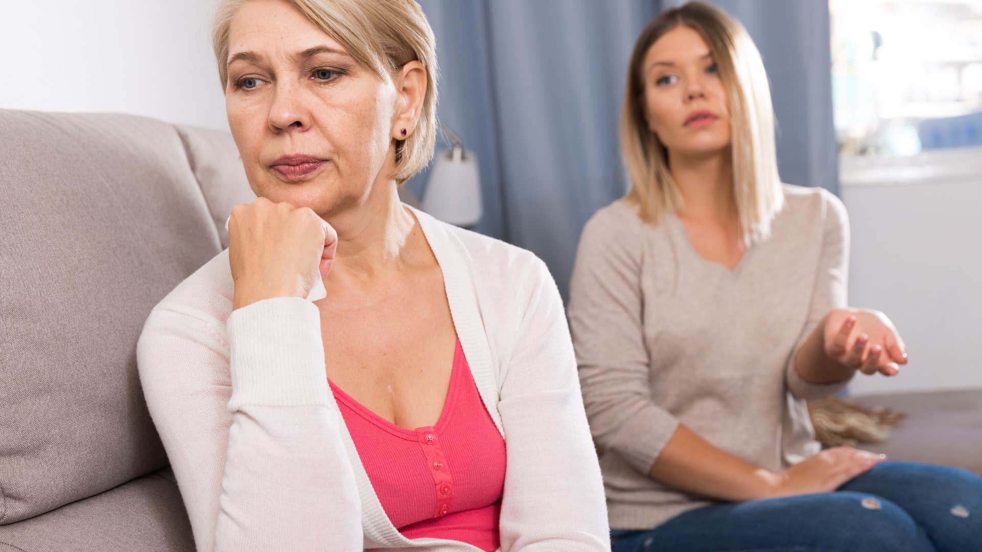 woman who can't fully relax around her parents because of unaddressed issues