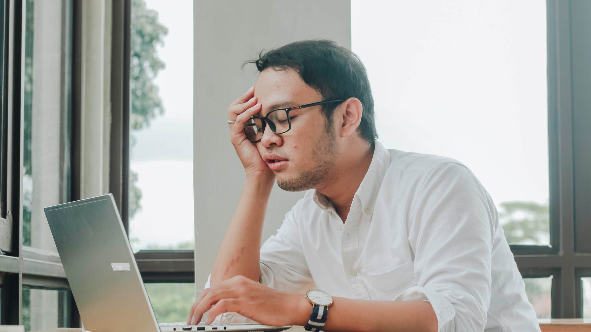 man who feels guilty for resting as he focuses on activities that return his investment