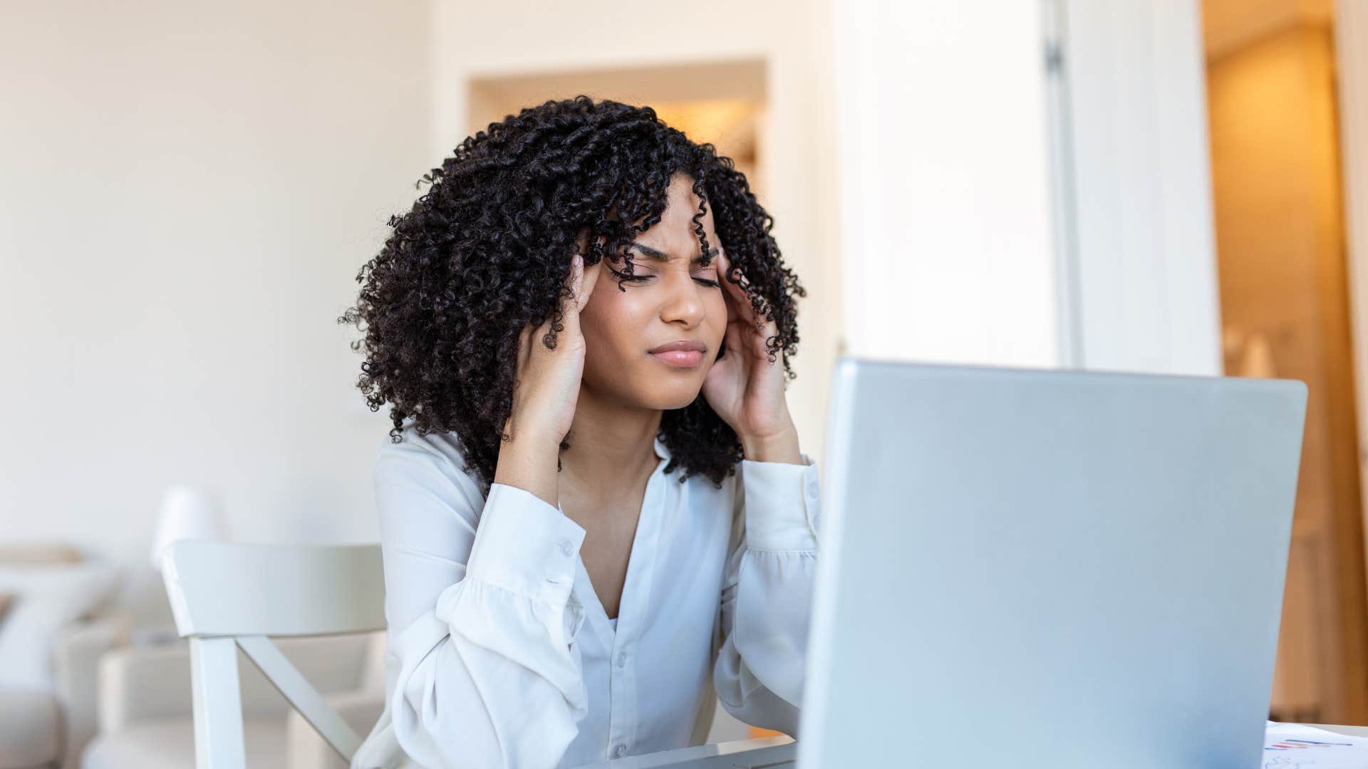 woman who feels guilty for resting as work imposes on her downtime