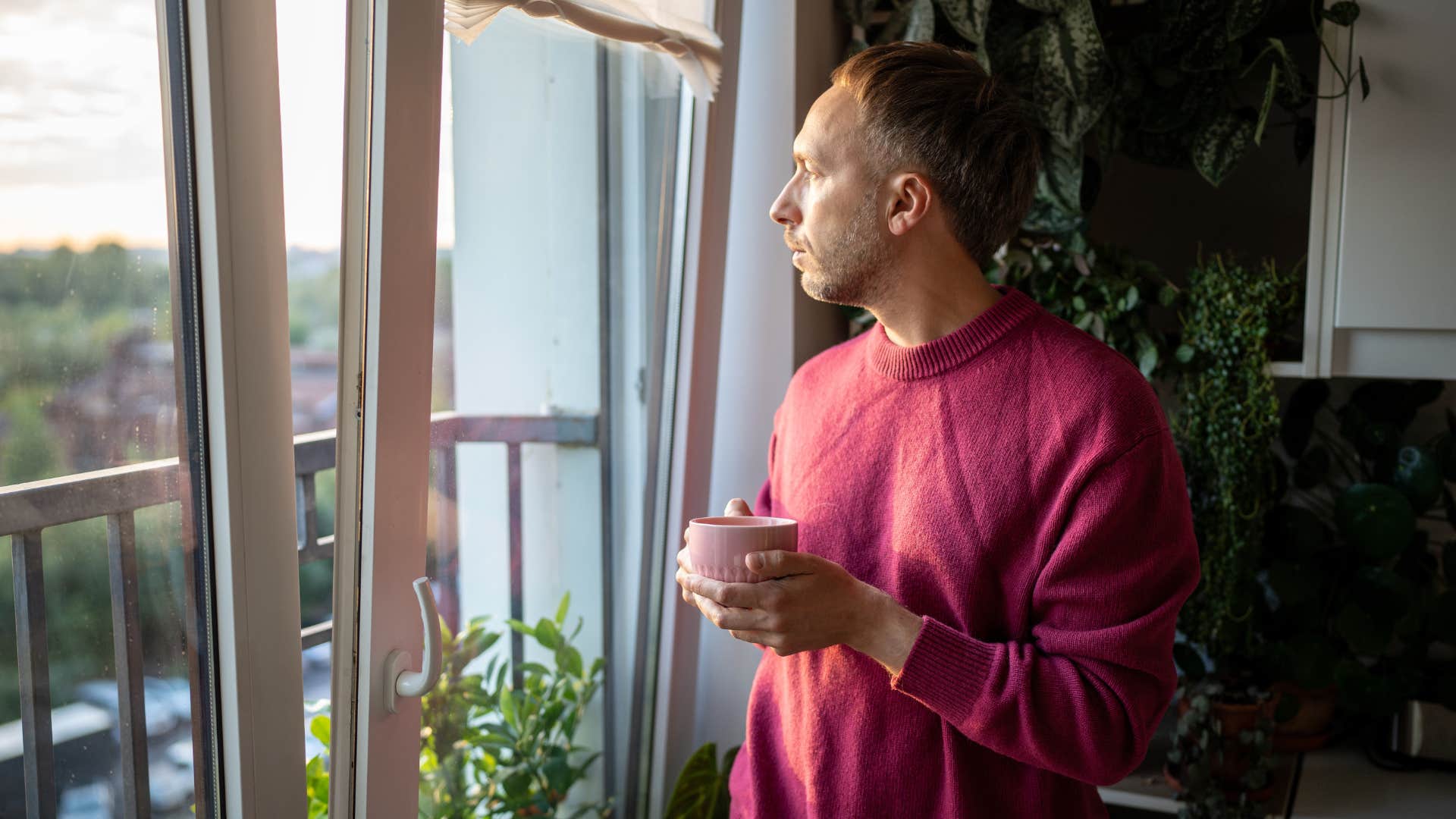 middle aged man enjoying silence at home