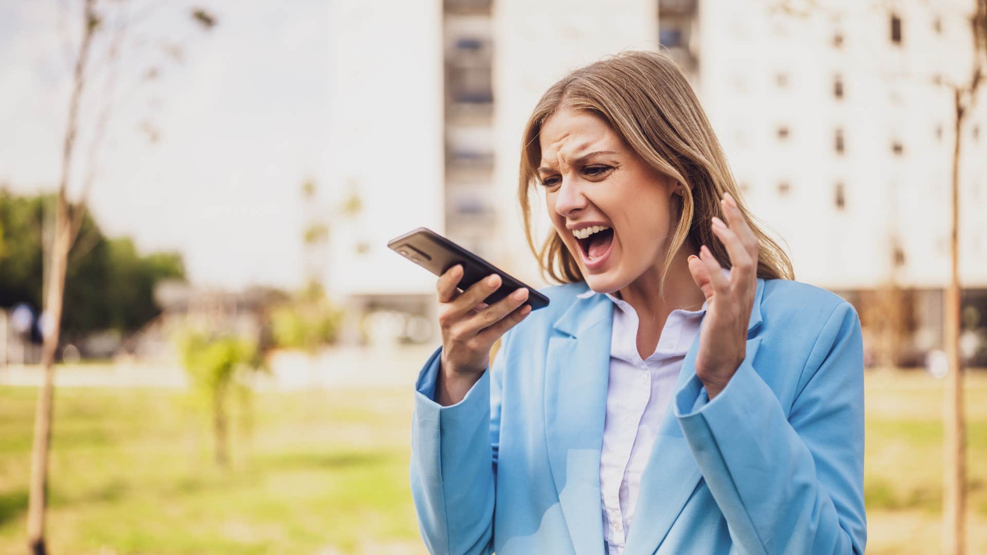 controlling woman yelling into the phone