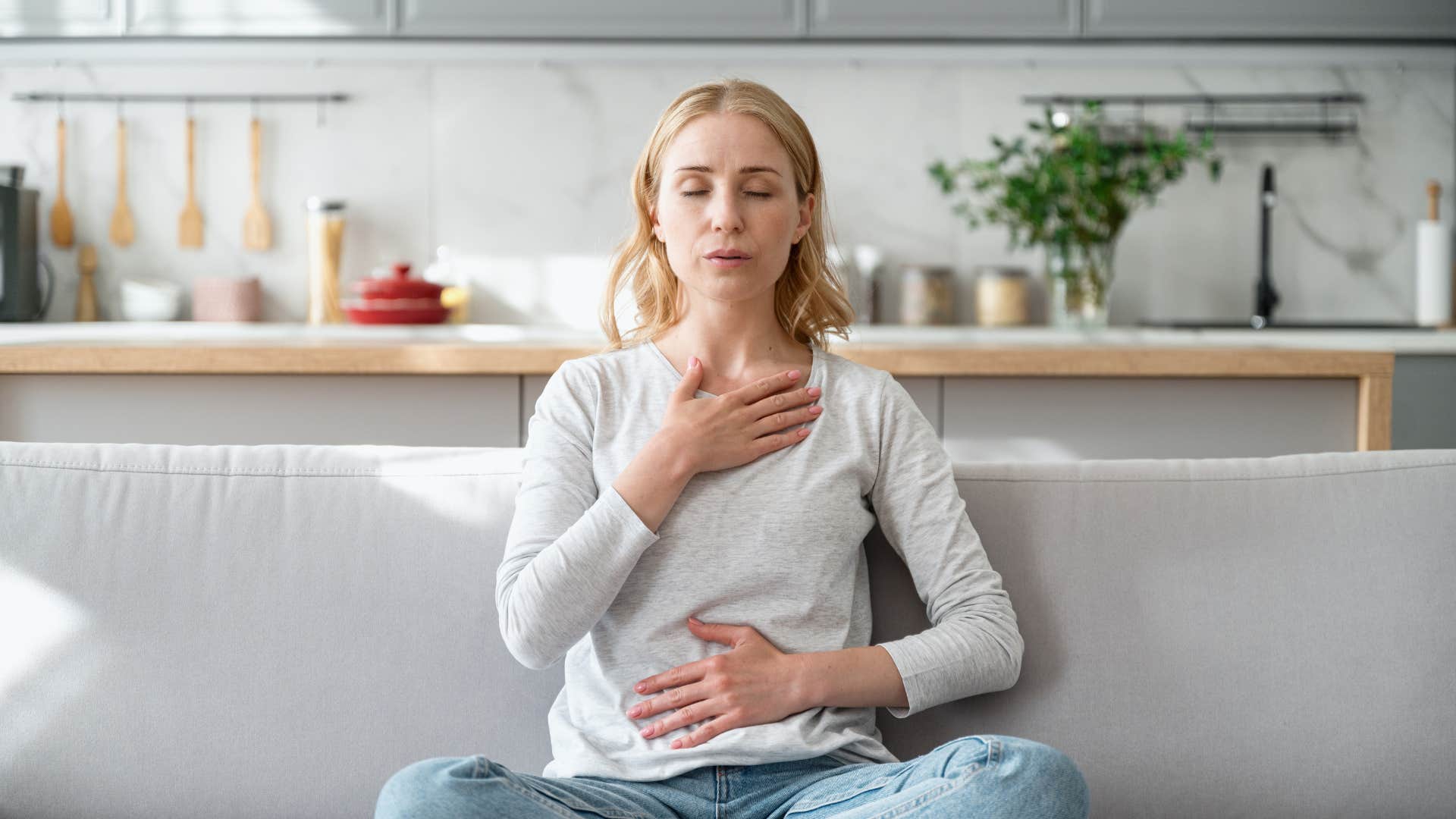 woman meditating to calm nervous system