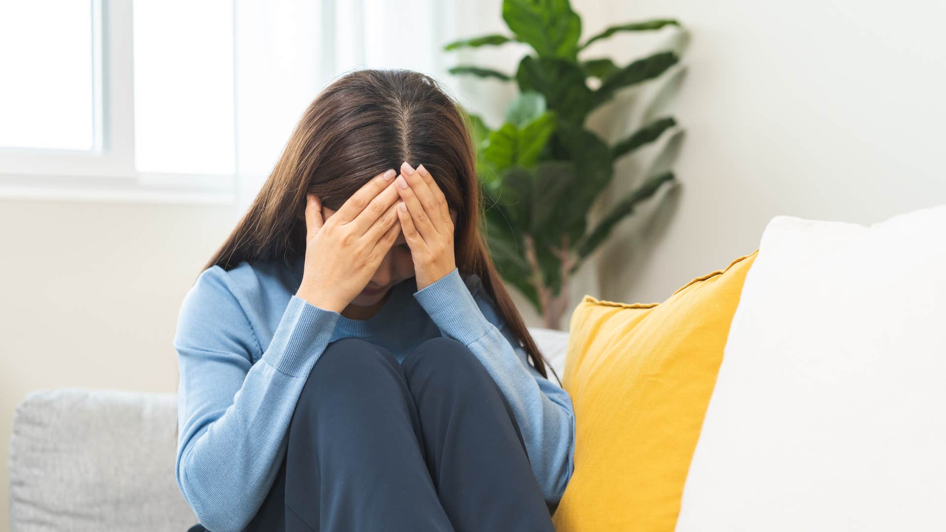 sad woman fearing disappointing others