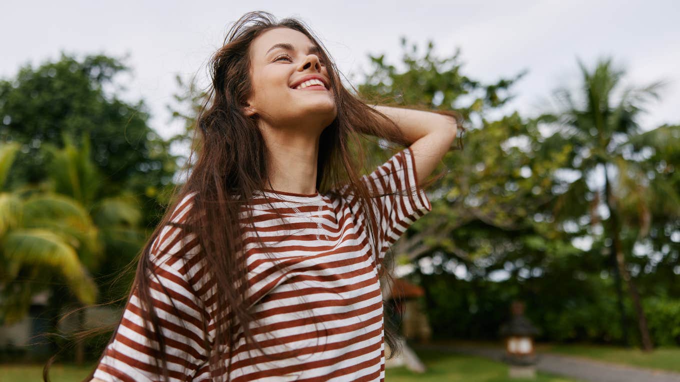 woman who loves taking pictures enjoying life
