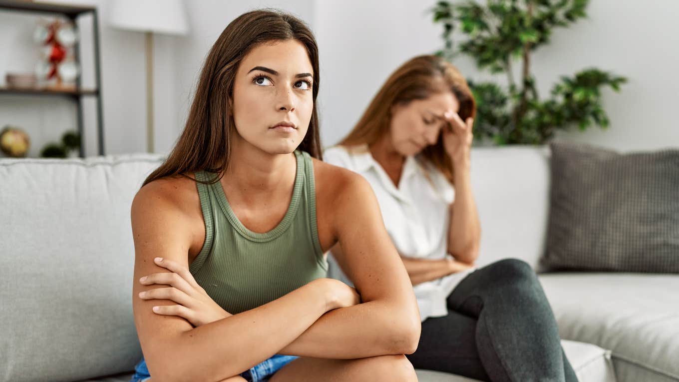 adult woman annoyed with mom turned away from her