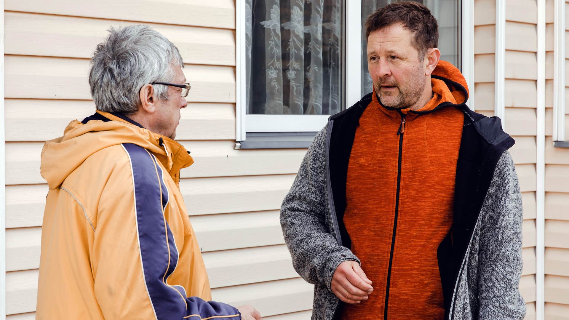 frustrated man telling father it's my life