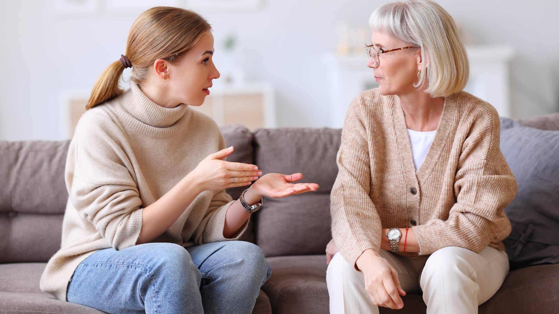 annoyed woman reiterating to older mom I literally just said that