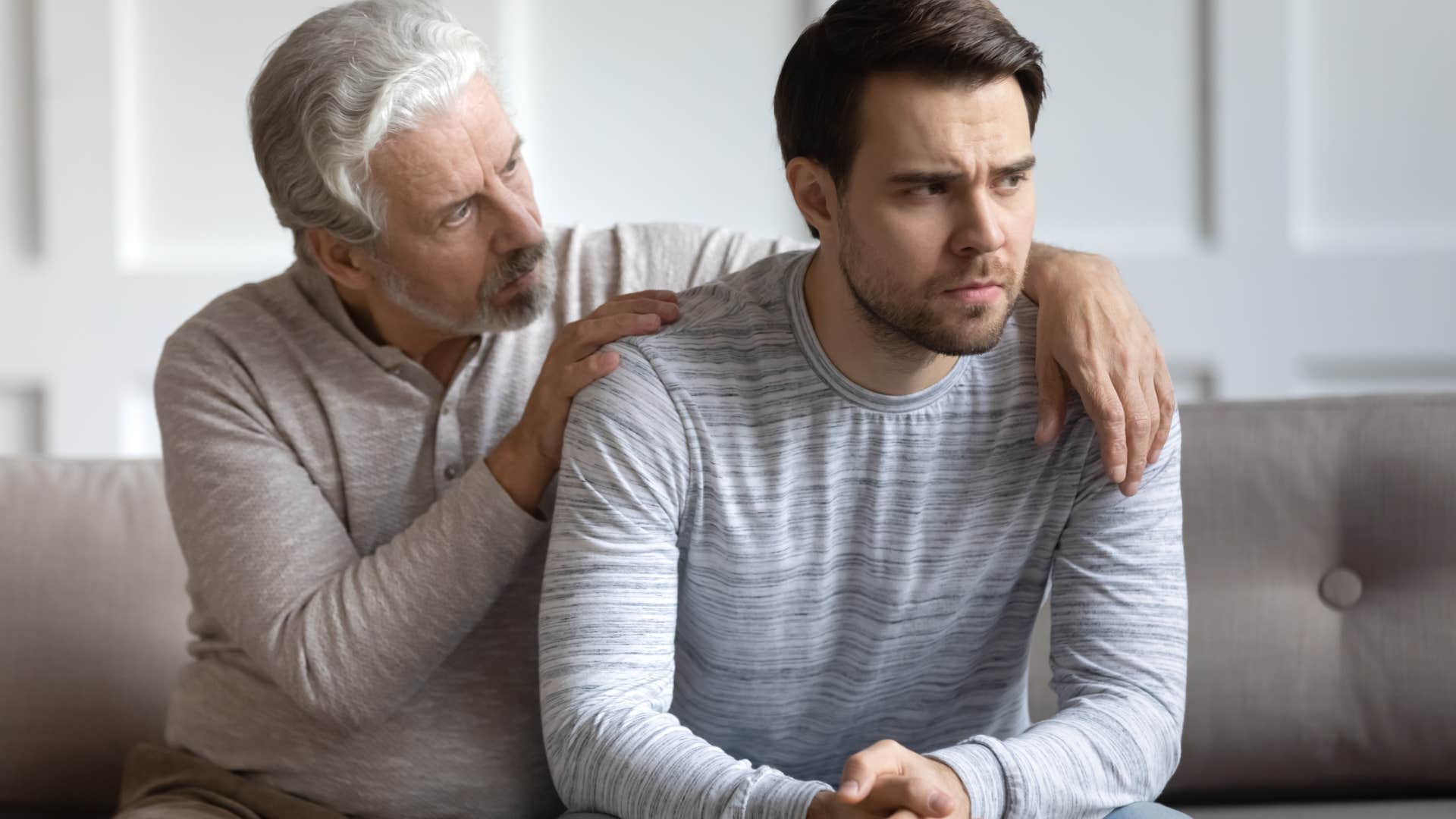 Man saying "you don't need to explain yourself" to his son.