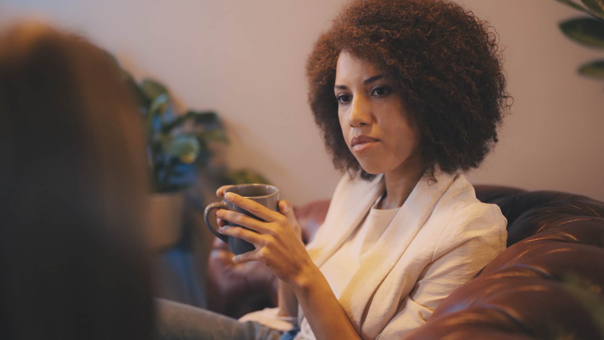 Woman saying "I've been there before" to a friend.