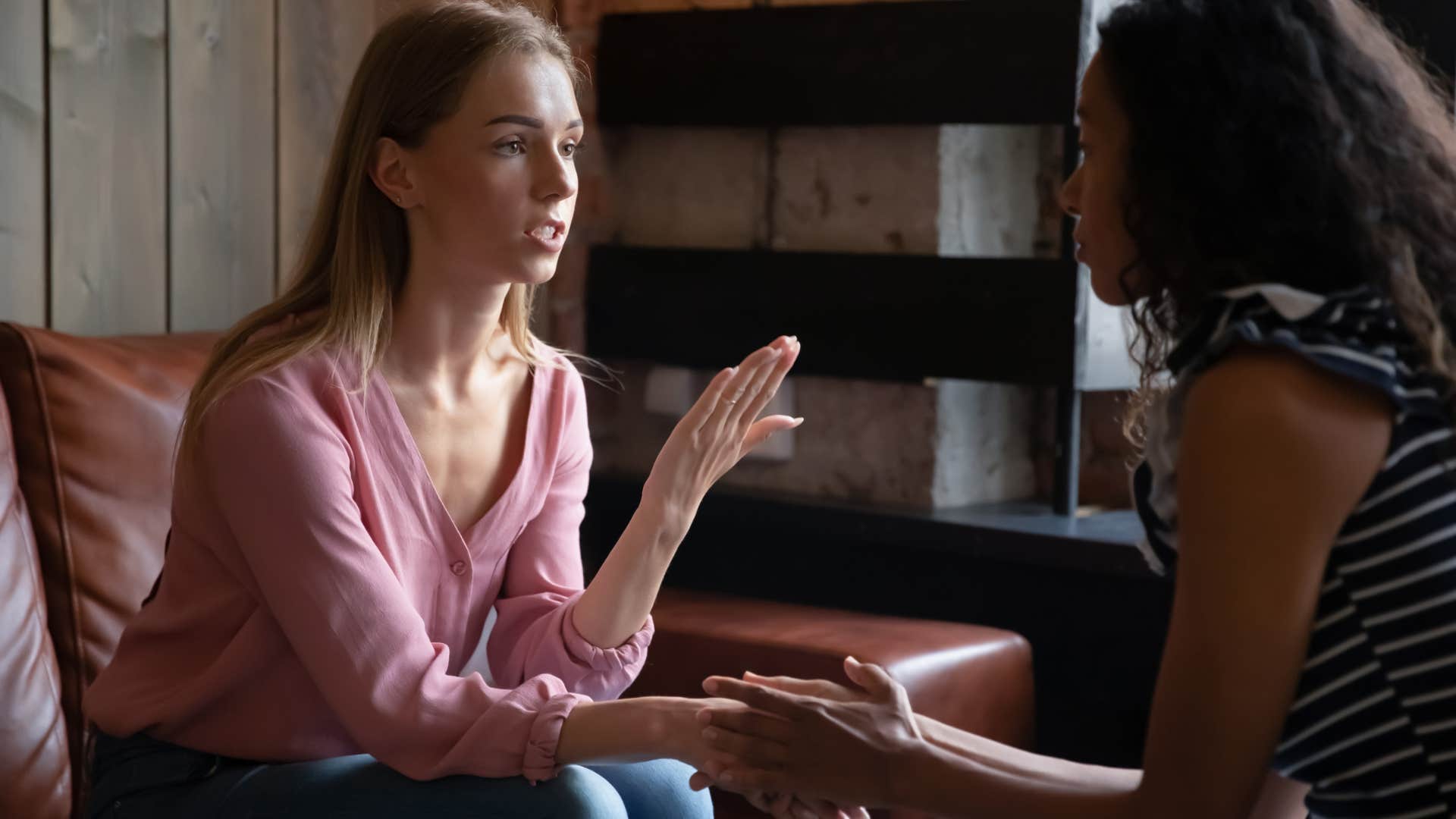 woman saying sorry to friend