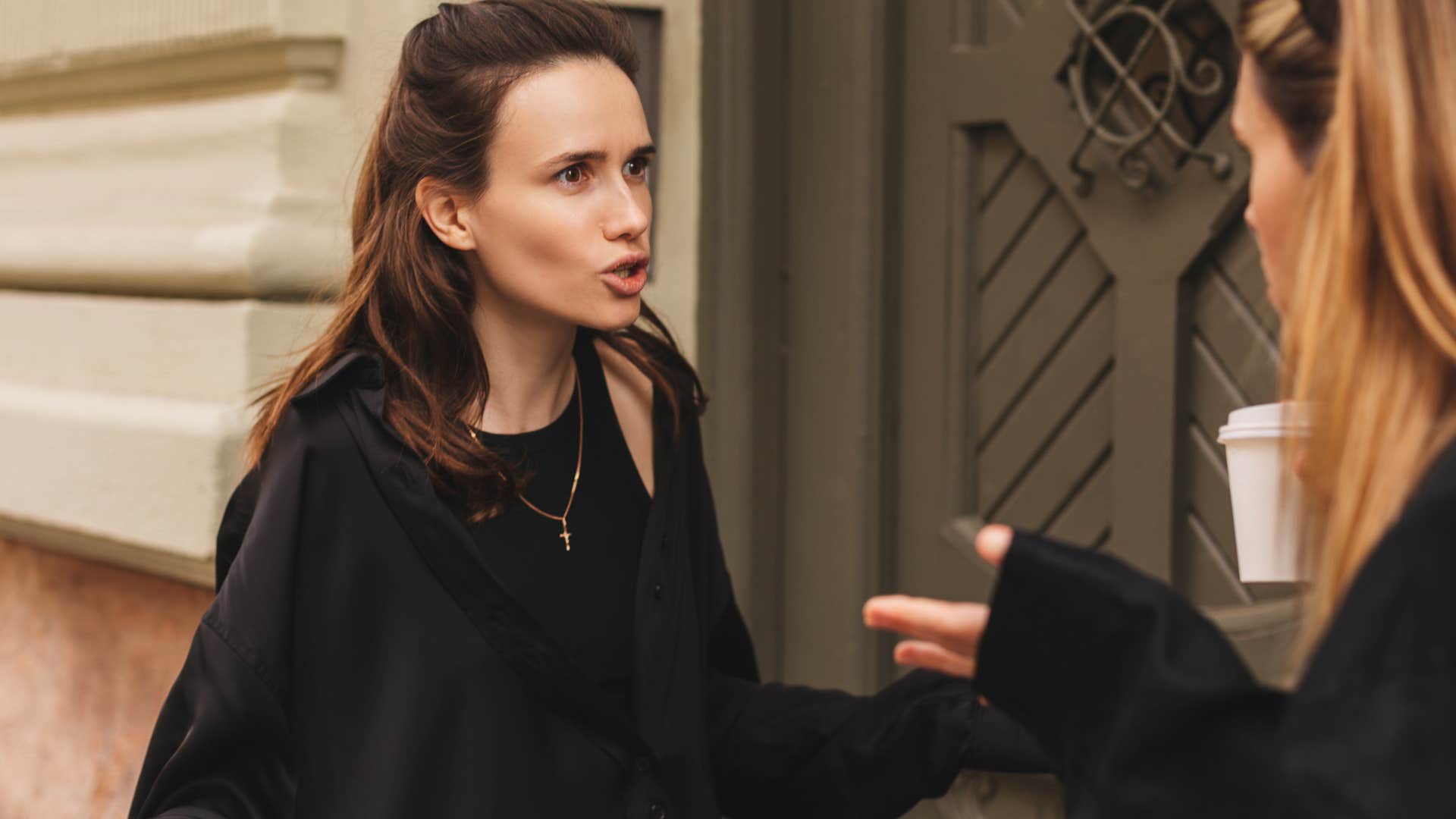 angry woman yelling to friend I could've told you that