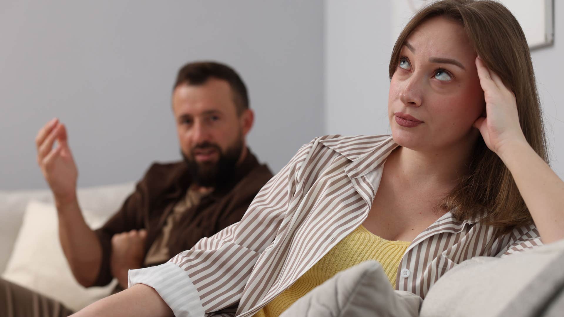 woman rolling her eyes saying I was just joking to offended partner